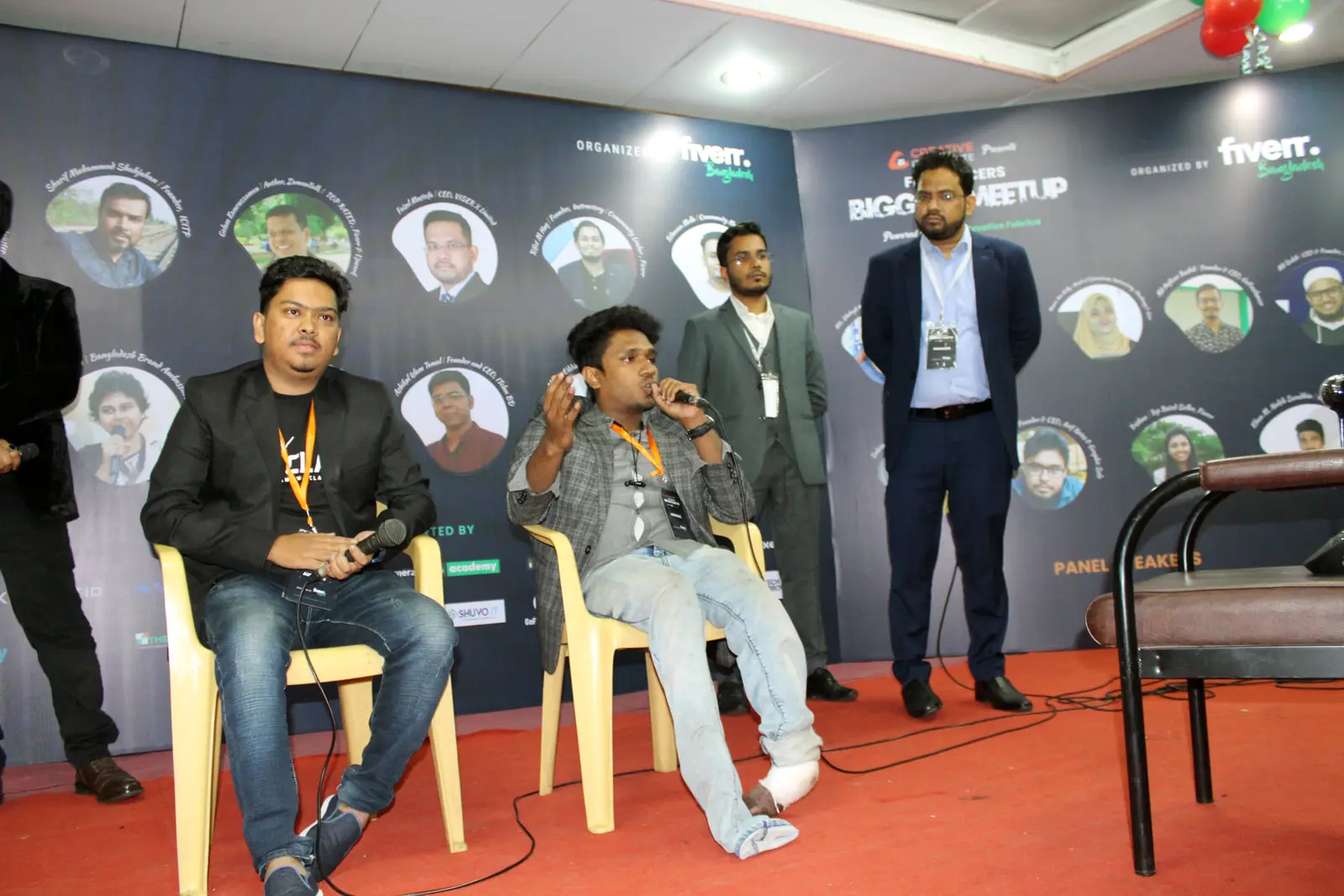 Anik Mahmud on a Fiverr community programme stage in 2021.