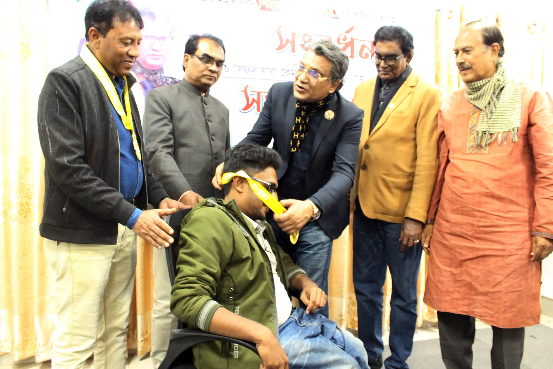 Anik Mahmud with fellow honourees at the Gunijon Shommanona programme in 2023.