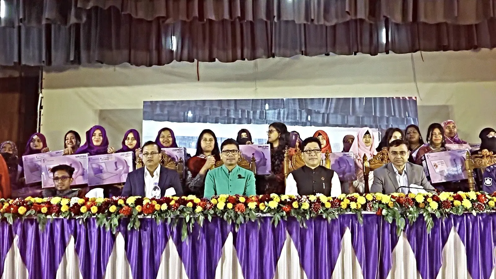 Anik Mahmud seated with public officials at a Meherpur programme where he proposed support for creating skilled freelancers.