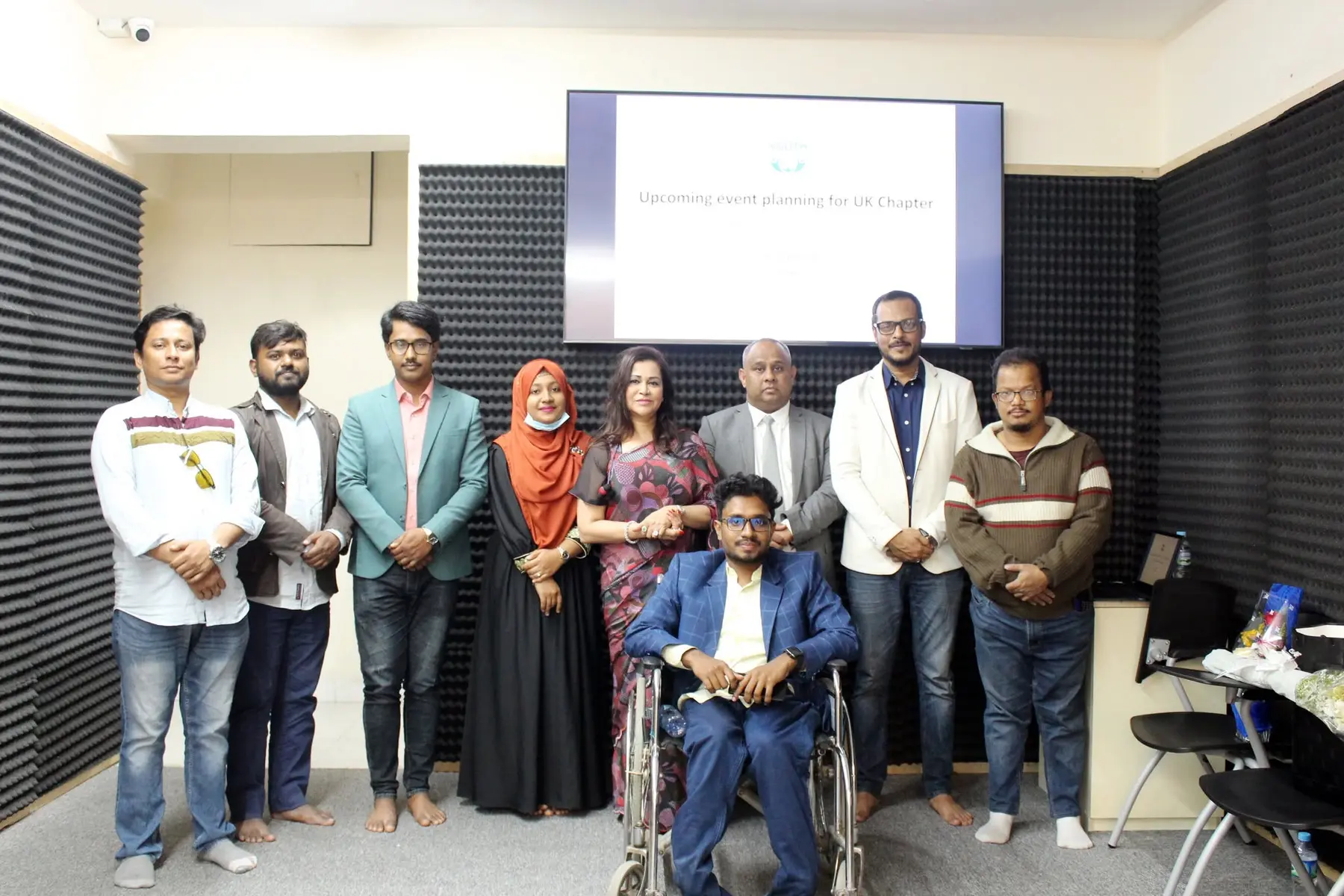 Anik Mahmud with participants after a planning meeting for an upcoming UK Chapter event in late 2023.