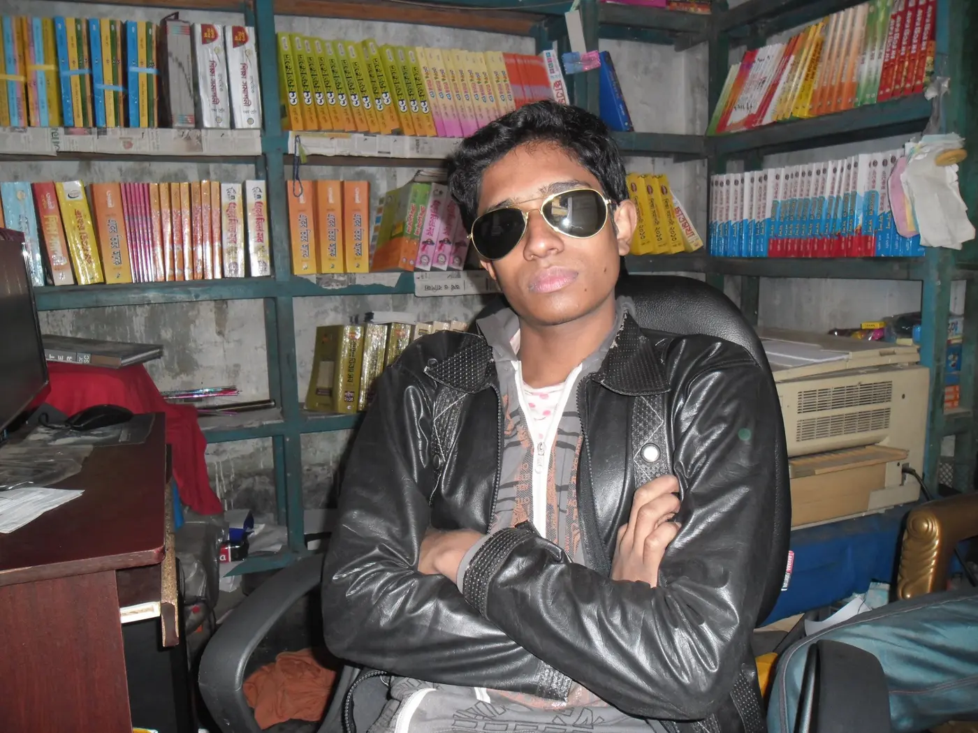A second 2014 view of Anik Mahmud in the shop where he studied and worked.